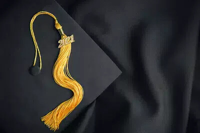 black cap and gold tassel