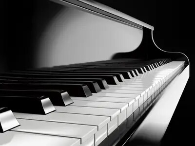 black keys on black piano