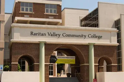 detail of front arches and college name