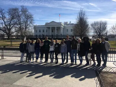 group of students in front of capitol