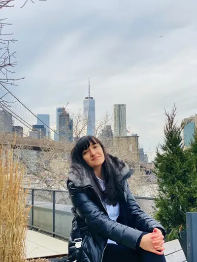 nagora ganieva with city behind her