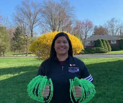 maria arevlo holding plastic headbands