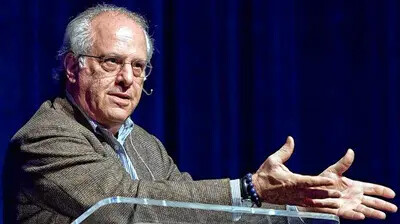 Richard Wolff at podium