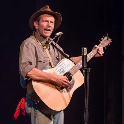Randy Noojin as Woody Guthrie