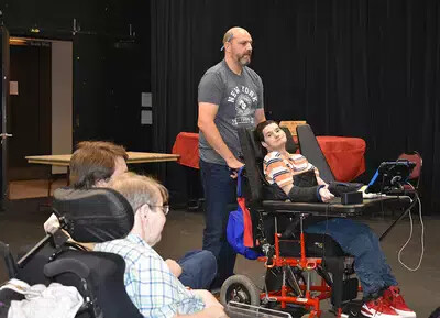 dennis russo with chet cheesman in wheelchair