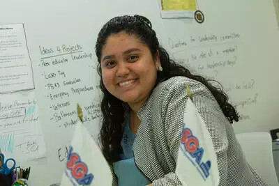 sga student with long brown hair