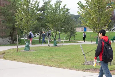 students walking on campus outside