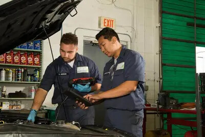 looking under hood of car