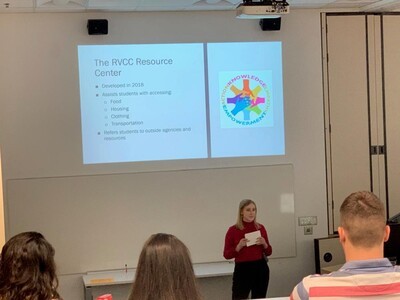 female student with slide about rvcc resource center