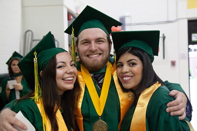two female and one male grad