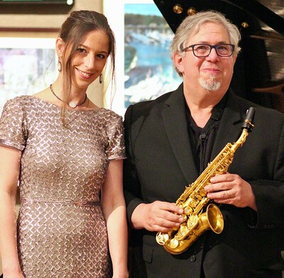 cropped photo of anna keiserman and paul cohen sax player