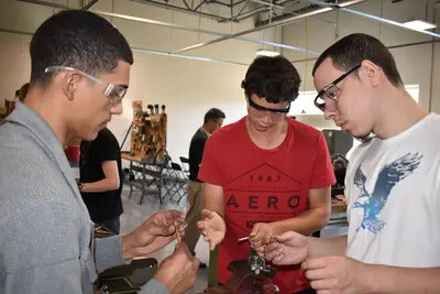 three hvac students