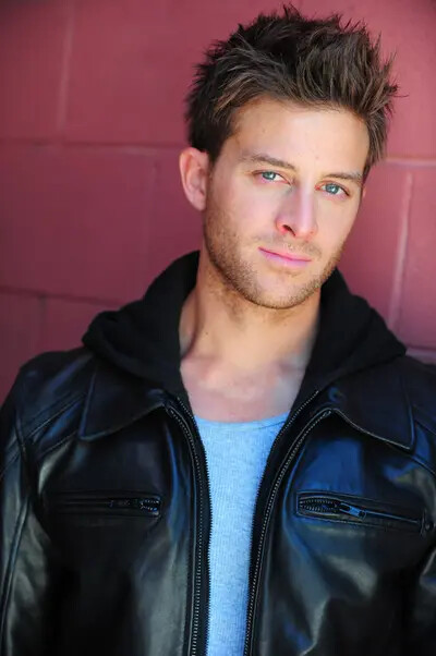 k-von wearing black leather jacket