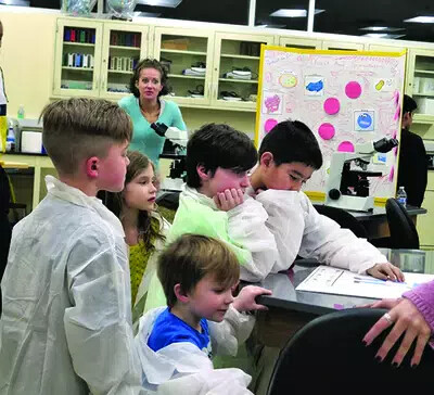 several kids at little scientist night