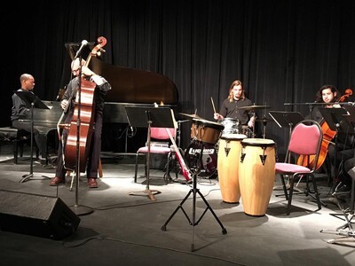 small musical ensemble with drums and bass