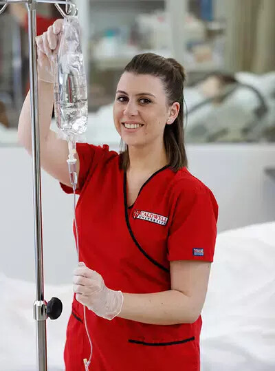 caldwell nursing student in red shirt