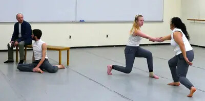 dancers on bended knees