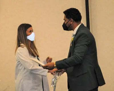 ota female student and beau younker at pinning ceremony