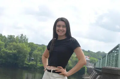 Rebecca McKinnon with hands on hips