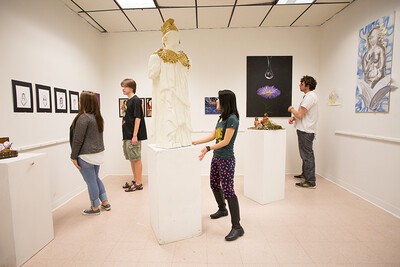 students looking at artwork