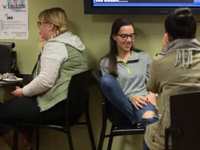 Students relaxing in cafe