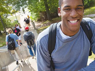 students walking on stairs outside Bateman Center