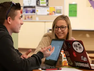 male and female students talking