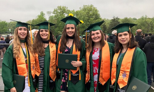 group of 5 female honors college grads outside