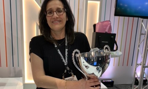 woman in black shirt with trophy