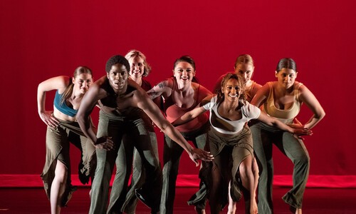 group of rvcc dancers with red background