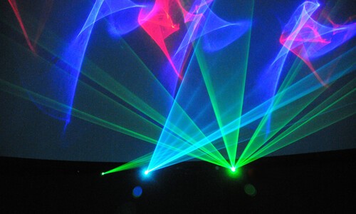 laser image with blues, purple, green, pink