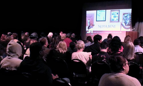 audience watching nota bene event in theatre