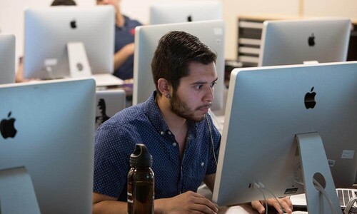 youngbearded man in computer lab 