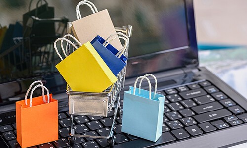 shopping bags on laptop