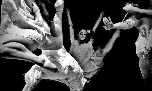 dancers leaping in air