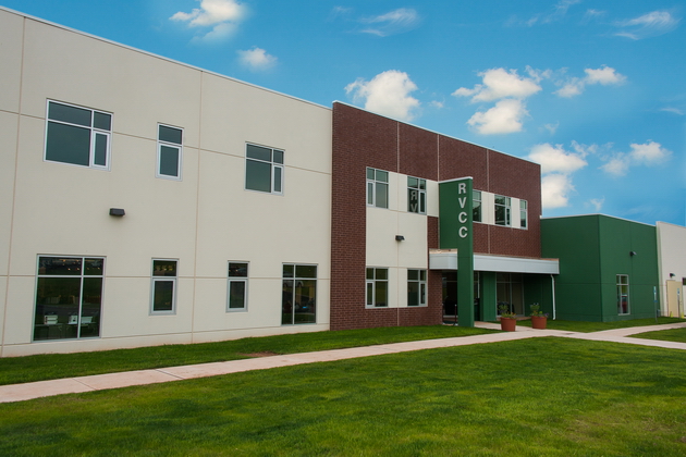Outside of the Workforce Training Center, two story building