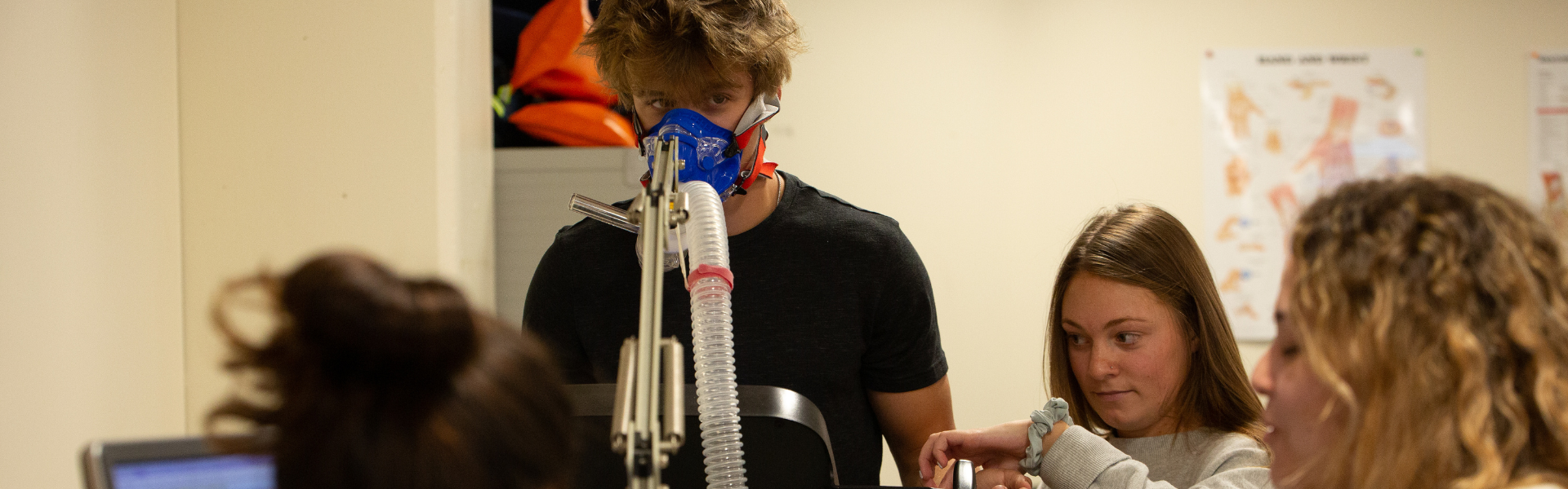 Image of two students in an RVCC kinesiology lab.
