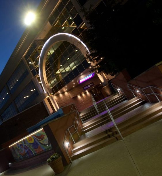 Image of the entrance to the Theatre at RVCC at night.