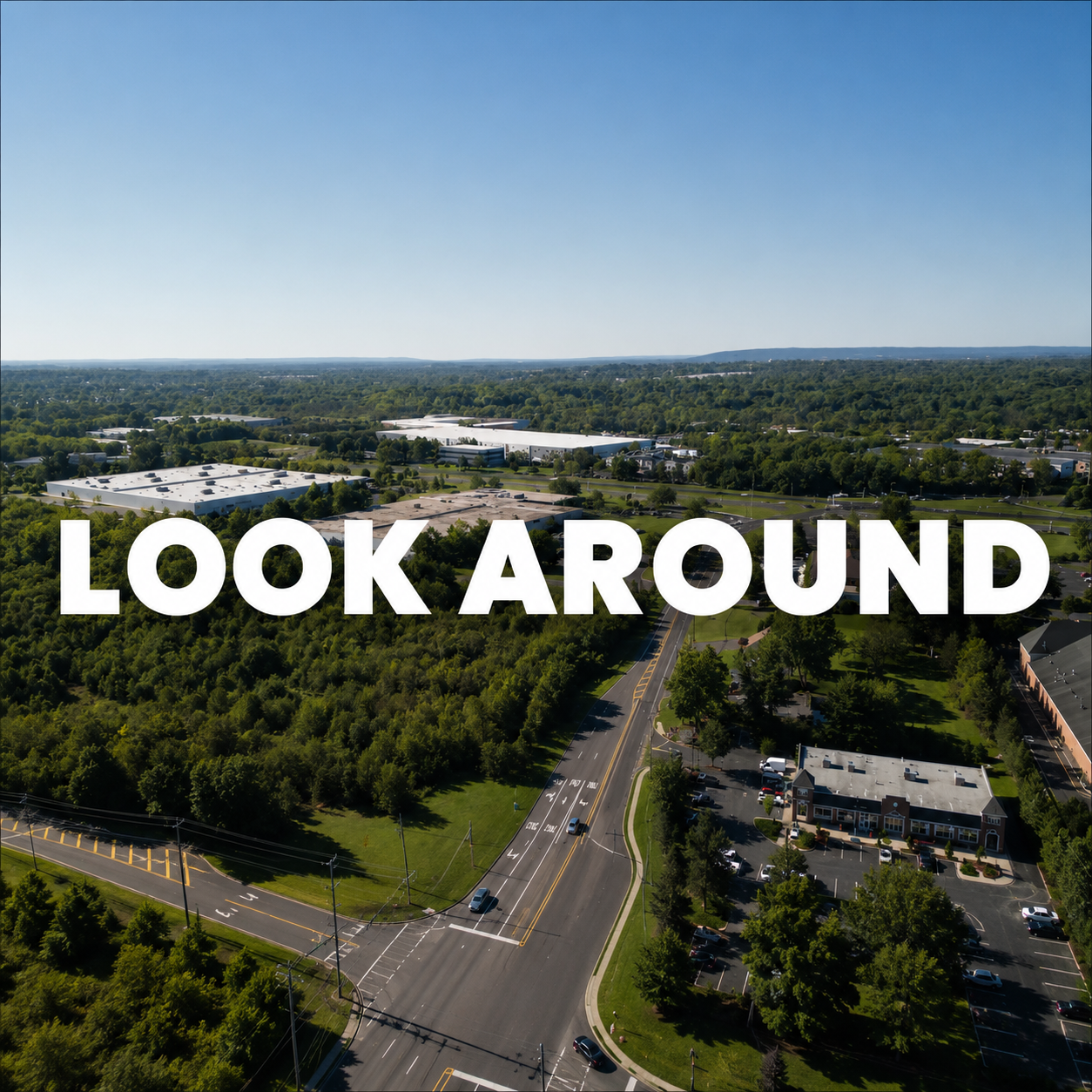 Aerial view of Somerset County, New Jersey, featuring a mix of wooded areas, open green space, office buildings, and commercial properties beneath a clear blue sky. Large white text across the center reads, “LOOK AROUND.”