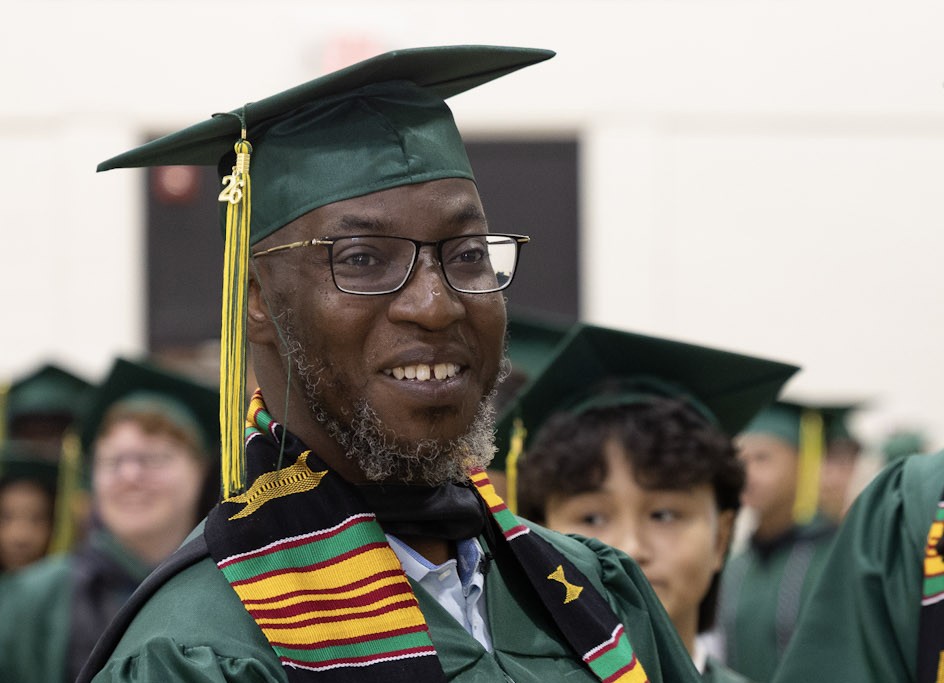 older grad wearing kinte stole